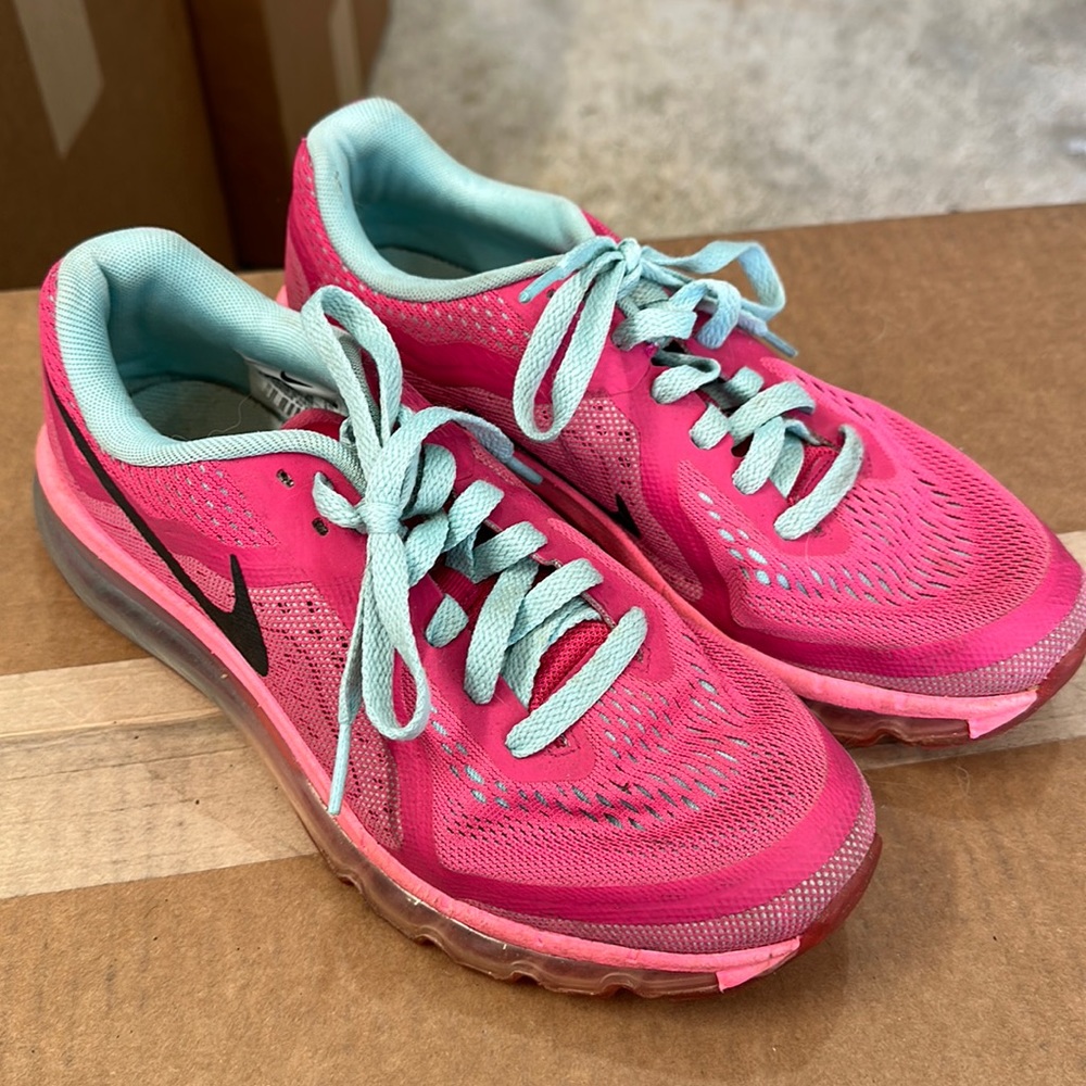 Nike tennis shoes. Hot pink with light turquoise. Great condition